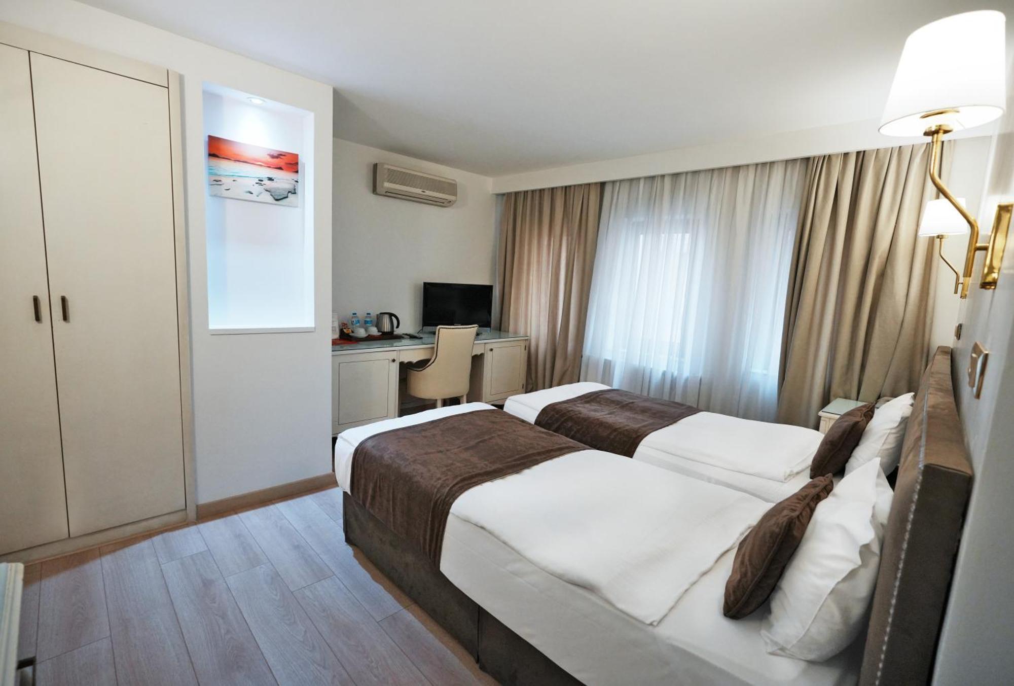 Taximtown Hotel — الصور 1